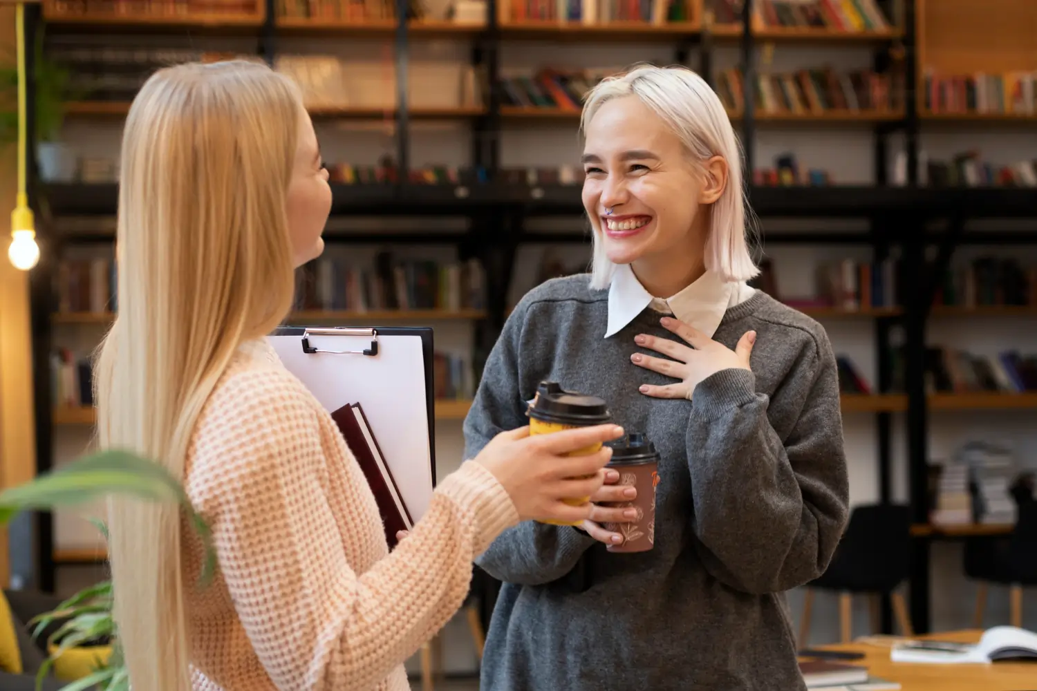 two ladies talking at work